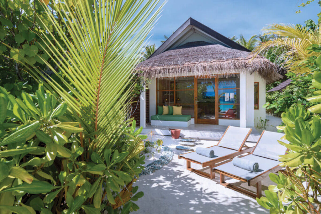 Beach villa in Maldives with white sand