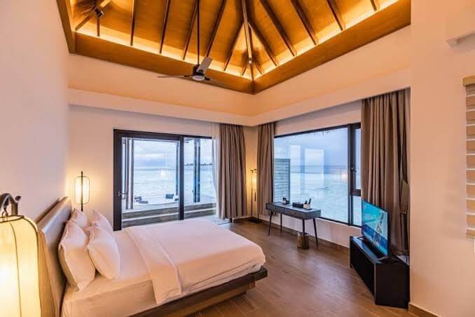 Beach villa room interior at NOOE Maldives Kunaavashi with ocean view
